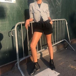 Cute cropped blazer. Perfect for the summer time to pack on a chillier night